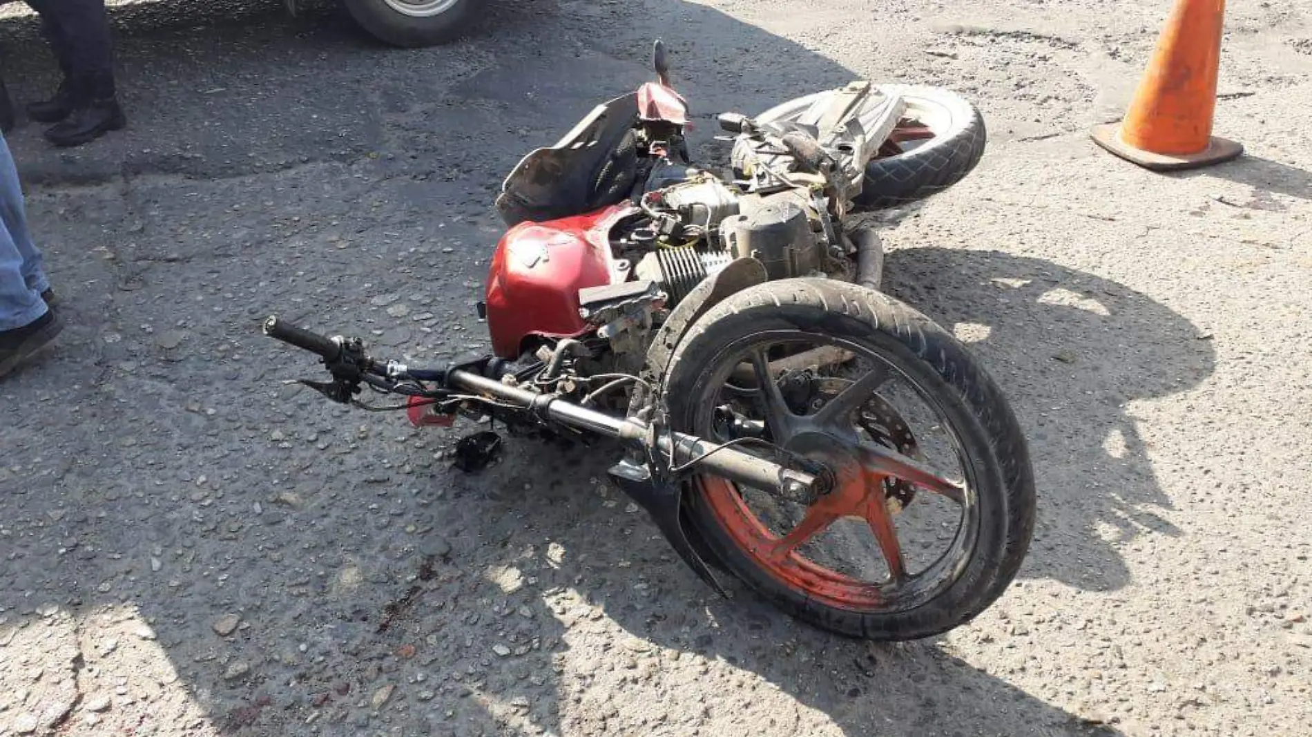 Motociclista lesionado automovil 2